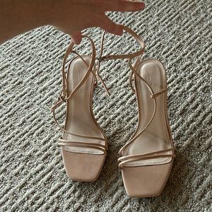 Nude patent strappy heels